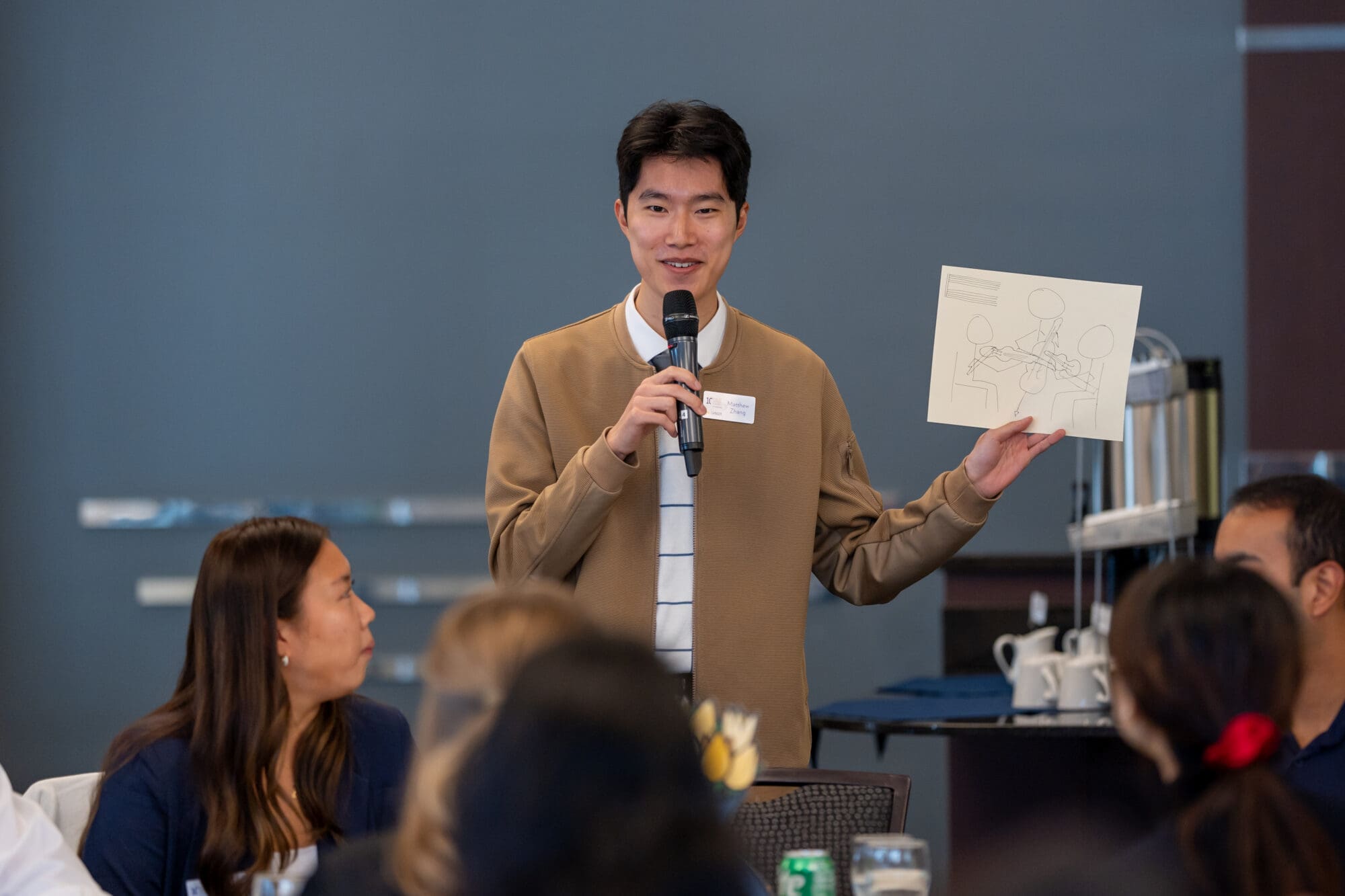 Student speaking at the Ross Leaders Academy Kickoff event at Zingerman’s Greyline in Ann Arbor, MI on October 25, 2024. AP Style
