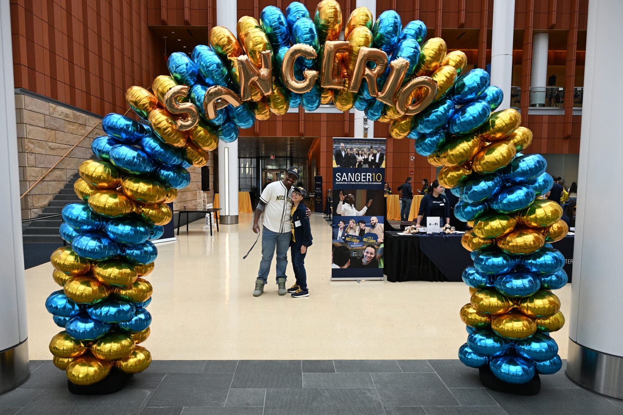 A student approaches the press conference stage at the 2023 Leadership Crisis Challenge