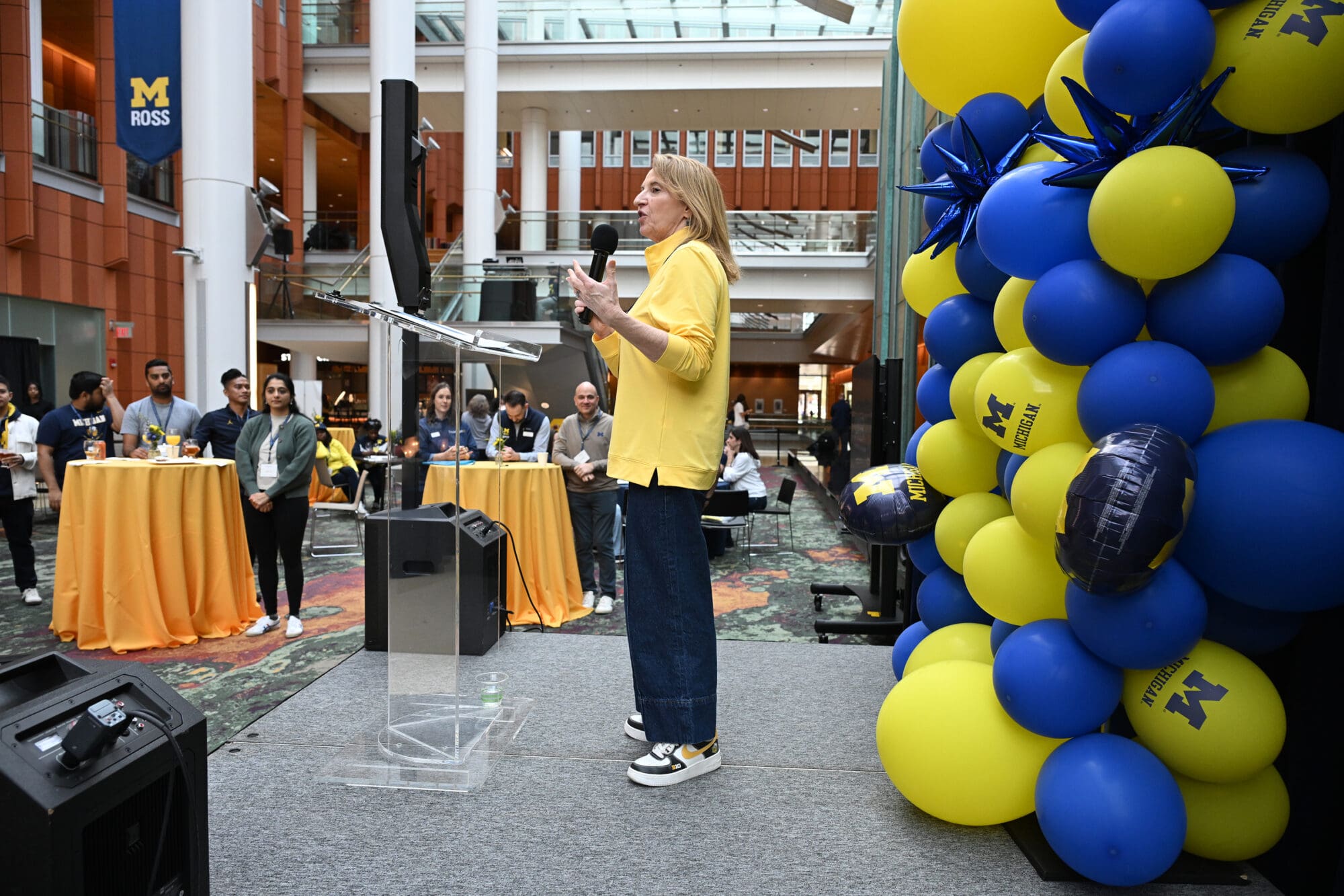 Students cheer for their classmate presenting at at the 2022 Story Lab Showcase